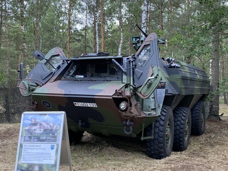 Transportpanzer Fuchs with open doors and an information board on the equipment display