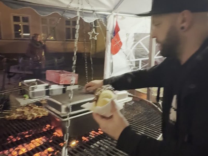 Open grill with skewers at the Christmas market